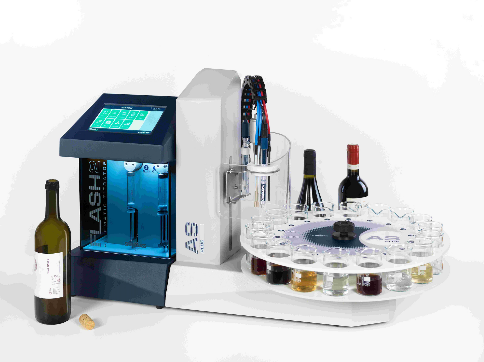 An automatic titrator machine, primarily white and blue in color, with bottles of varying colors placed around it, indicating a laboratory setting.